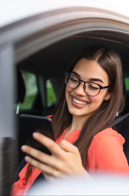 Girl Searching for Mobile Windshield Repair